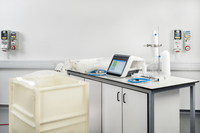 Flowstar V LGR single-use filtration system with tubing, filters, and process container on a laboratory bench