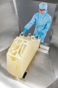 Xcellerex™ magnetic mixer biocontainer shown being transported