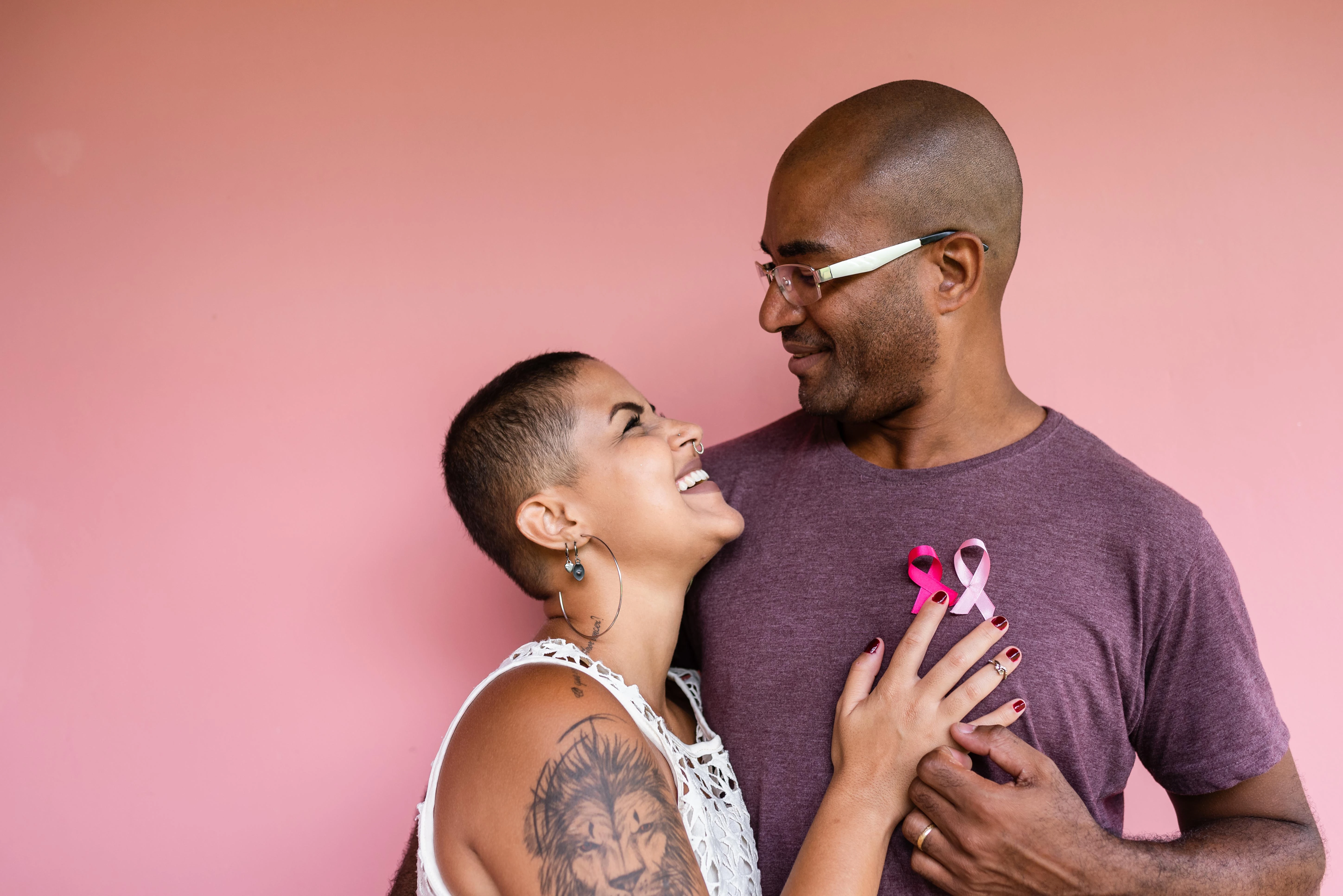 Couple support during breast cancer awareness month.