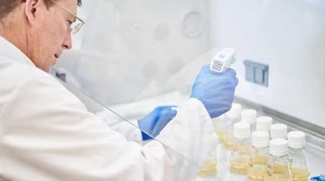 Figure 2. A scientist working on cell culture in the small scale