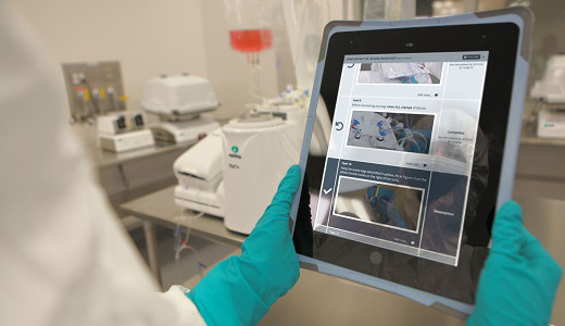 GMP lab scene with Chronicle tablet close-up with Sefia and Xuri Cell Expansion system in background