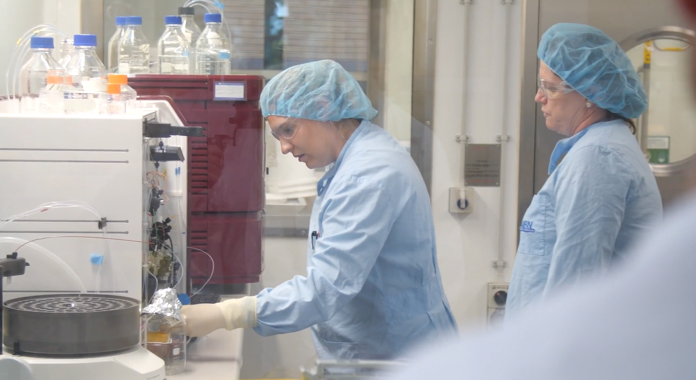 University of Queensland scientists working on vaccine research program in the lab.