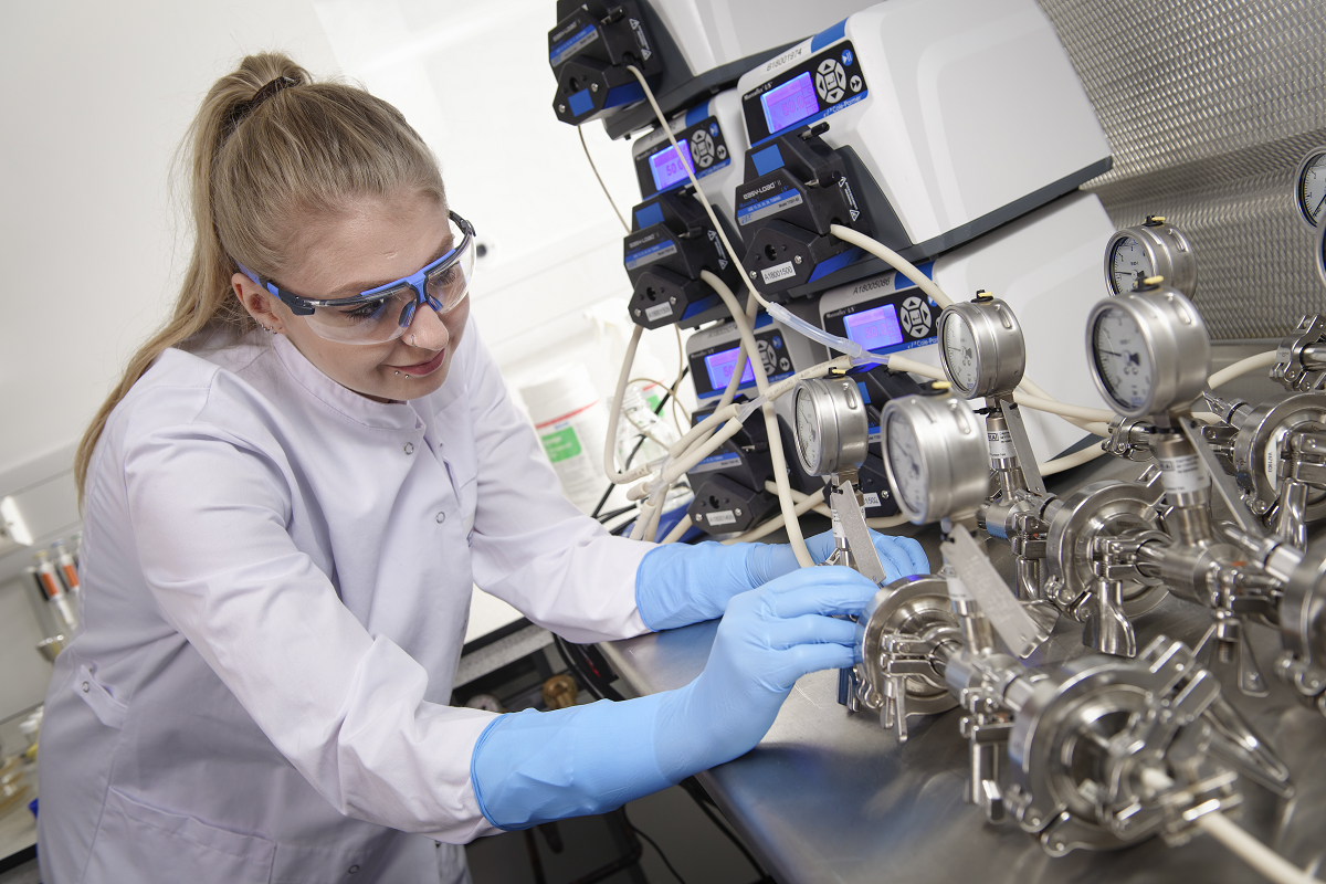 Process validation expert performing microbial retention testing on sterilizing-grade filters