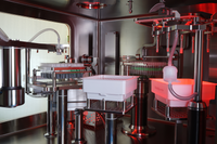 Robotic material handling inside the SA25 Aseptic Filling Workcell